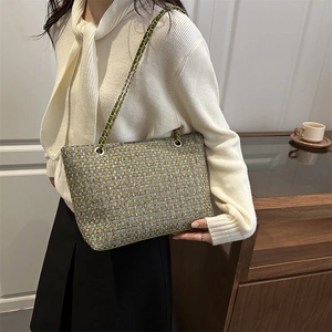 Fashionable tweed woven tote bag with gold chain strap in green and yellow plaid style