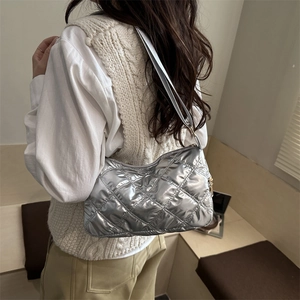 Silver metallic quilted hobo bag with classic diamond stitch pattern for women