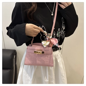Pink croc-effect mini handbag with silk scarf handle detail and metal clasp lock