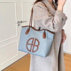 Vintage large contrast tote bag in light blue woven fabric with brown leather handles