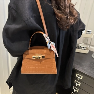 Women's camel croc-embossed Kelly bag with silk scarf handle for shoulder or crossbody use