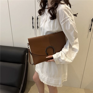Deep brown leather envelope clutch bag with metal ring buckle for daily commuting