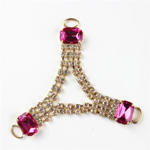 Detailed Y-shaped gold trim with rose red crystals and rhinestones for shoes