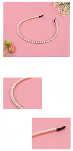Detail of white pearls on golden headband with black fabric-wrapped ends for comfort