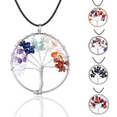 Detailed display of five colorful wire-wrapped tree of life necklaces with diverse gemstones