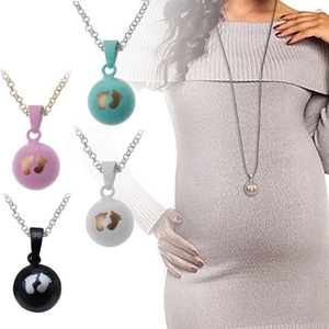 Harmony ball pendant with baby footprint design in four colors for pregnancy