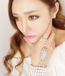 Elegant silver pearl ring bracelet with crystal floral design and layered hand chain