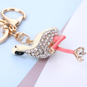 Porte-clés flamant rose doré avec émail blanc et strass scintillants pour décoration