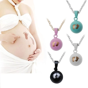 Pregnancy chime ball necklace with baby footprint pendant in four pastel colors
