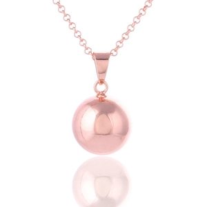 Polished rose gold chime ball necklace on minimalist chain with mirrored reflection