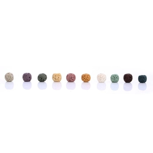 Macro shot of colorful porous lava stone beads for essential oil diffuser jewelry