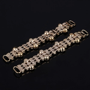 Pair of gold crystal shoe charms with sparkling rhinestone chains for sandals