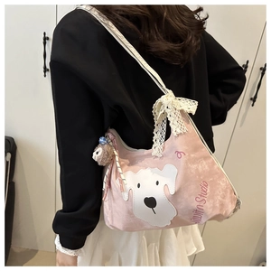 Pink canvas backpack with white puppy embroidery, lace bows, and sheep plush charm
