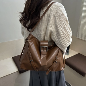 Vintage brown PU leather tote bag with decorative metal buckles and large capacity