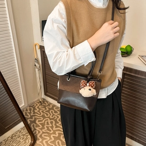 Minimalist brown dual-texture tote bag with suede and leather finish with bear charm