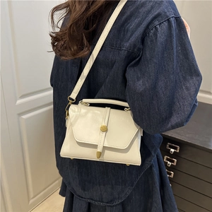 Minimalist cream white crossbody square bag with vintage gold buckle and top handle