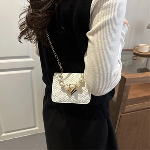 White woven leather crossbody bag with pearl handle and gold chain strap for women