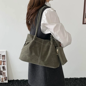 Olive green large capacity tote bag with contrast stitching and matching pouch bag