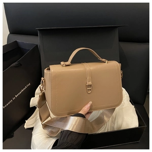 Chic light brown leather crossbody bag with gold buckle in an elegant gift box set