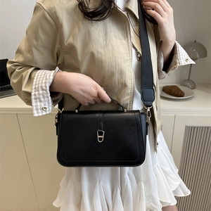 Minimalist black leather crossbody square bag with golden buckle for women's daily use