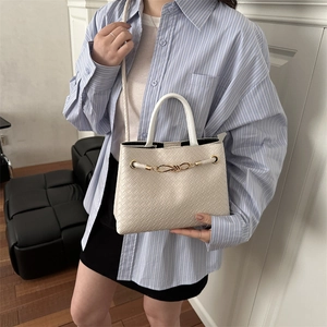Large capacity woven leather crossbody bag in cream white with gold chain detail