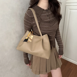 Classic khaki large tote bag with vintage printed scarf and soft matte leather texture