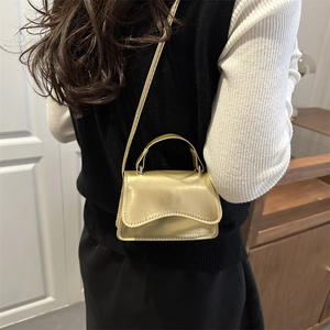 Minimalist metallic gold faux leather square crossbody bag with top handle for women