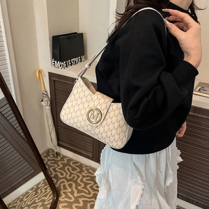 Retro monogram shoulder bag with beige M-print and golden metal buckle for women