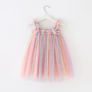 Detail of sequin star patterns on rainbow mesh tutu dress for girls with ruffle straps