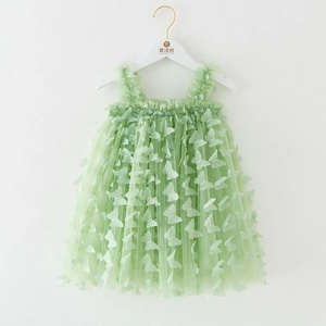 Close-up of light green girls' tulle dress featuring 3D butterfly embroidery appliques
