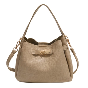 Chic beige lychee leather bucket bag with gold hardware and detachable shoulder strap
