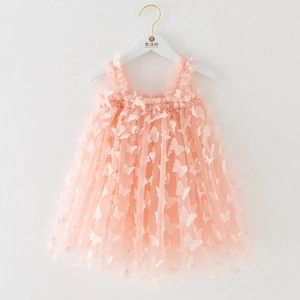 Detail of pink tutu dress featuring delicate 3D butterfly appliques and layered soft tulle mesh