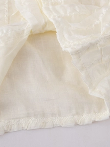 Beige tutu skirt details with pleated mesh fabric and smooth inner lining