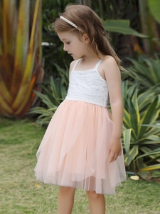 Detail of girls floral lace bodice and layered pink tulle mesh sundress for summer