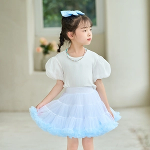 Detail of baby blue layered tulle tutu skirt with elastic waistband for young girls