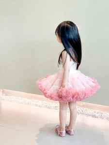 Pink tutu skirt outfit for girls with white sleeveless top and sparkly princess shoes
