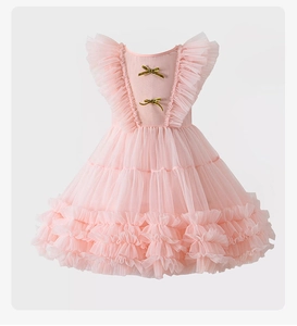 Rosa Mädchenkleid aus Tüll mit tiefem V-Rücken und funkelnden goldenen Pailletten-Schleifen