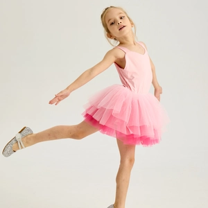 Detail of pink girls' ballet tutu dress featuring gradient layered mesh tulle and leotard