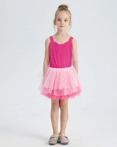 Detail of multi-layered pink tulle tutu skirt and sleeveless bodice on a girls ballet dress