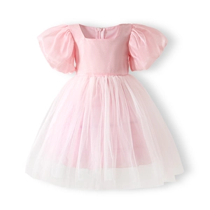 Detail of pink girls princess dress showing satin bodice and layered fluffy mesh tutu skirt