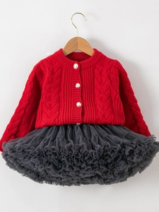 Girls Christmas outfit featuring a red knit cardigan and a grey layered mesh tutu skirt