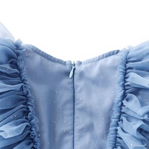Detail of blue tulle girl dress with sequin accents and back invisible zipper closure
