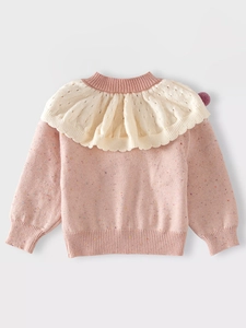 Pink confetti knit sweater for girls with large ruffle collar and pom-pom detail