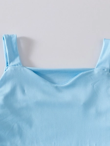 Detailed view of sky blue ballet dress neckline with square collar and thick straps