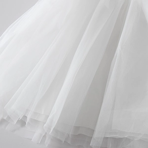 Detail shot of multi-layer white mesh tutu fabric for girls princess dress