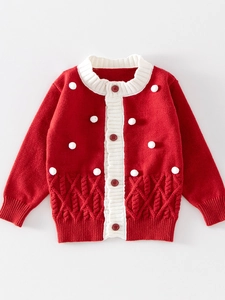Gilet de Noël en tricot rouge pour filles avec pompons blancs et détails en maille torsadée