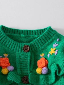 Girl's green knitted cardigan with colorful flower embroidery and wooden buttons
