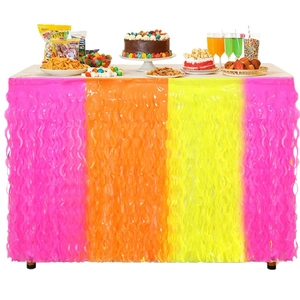 Rainbow wave fringe table skirt with pink orange and yellow tinsel for party decor