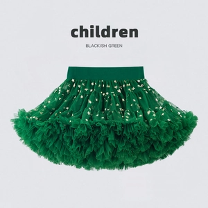 Détail de jupe tutu enfant vert foncé avec sequins étoiles dorées et taille élastique