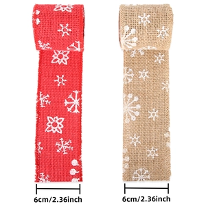 Faux burlap Christmas ribbon with white snowflake prints in red and natural wood colors